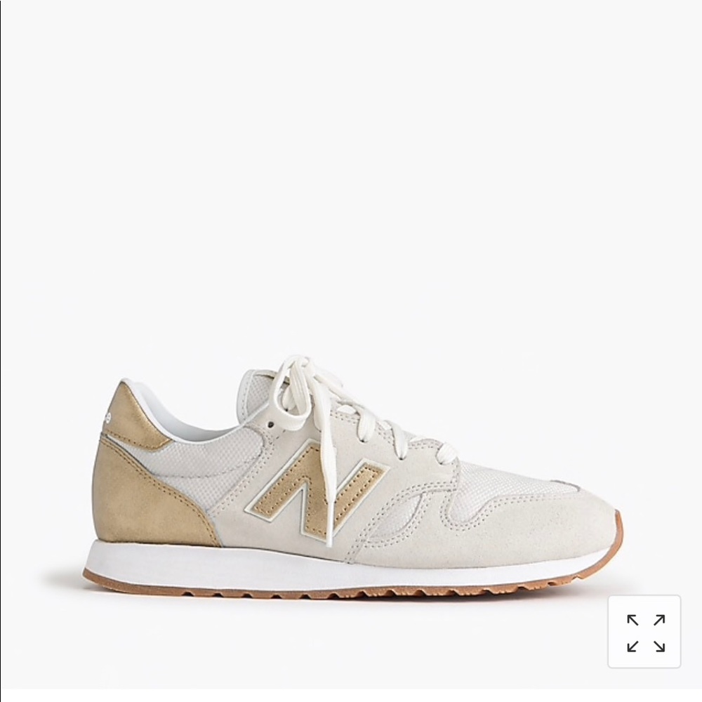 Metallic Gold + White New Balance 520 Sneakers